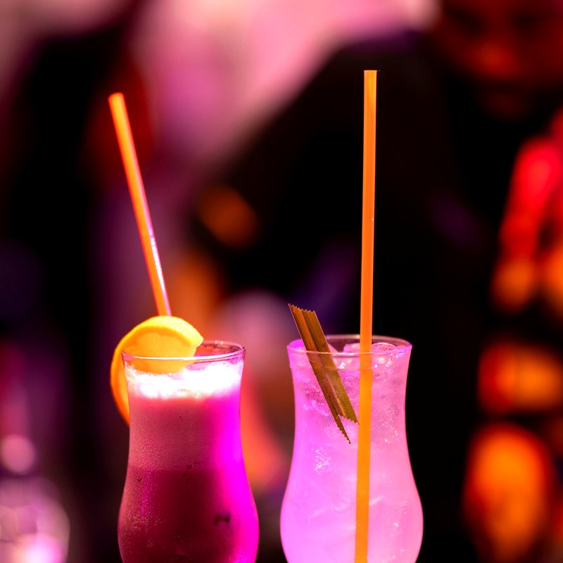 Candlelit bar interior at Aura Clubhouse, Tse Addo, Accra